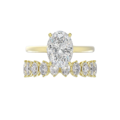 14K YELLOW GOLD 4 1/2CT ROUND/OVAL DIAMOND LADIES BRIDAL SET (CENTER STONE OVAL DIAMOND 3.00CT)
