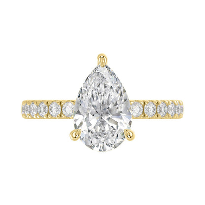 14K YELLOW GOLD 3 1/2CT ROUND/PEAR DIAMOND LADIES RING (CENTER STONE PEAR DIAMOND 3CT)