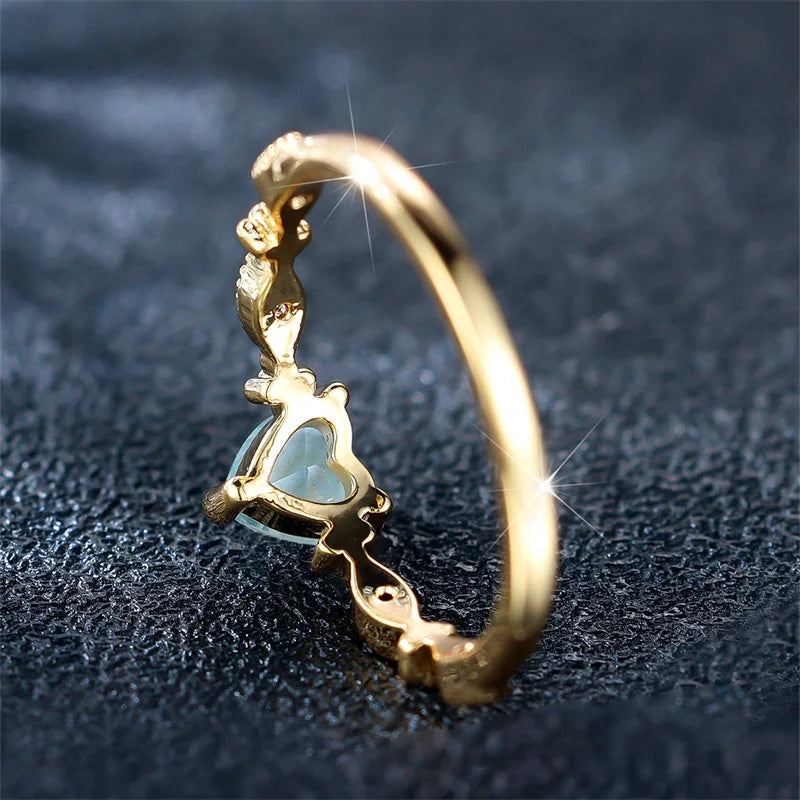 Trendy Yellow Gold Heart Ring with Blue Zircon