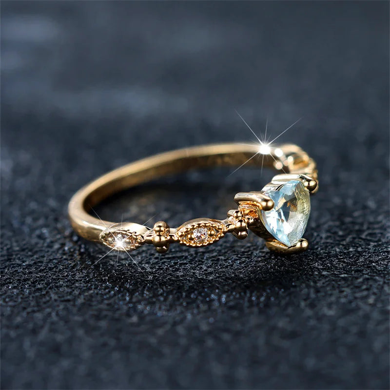 Trendy Yellow Gold Heart Ring with Blue Zircon