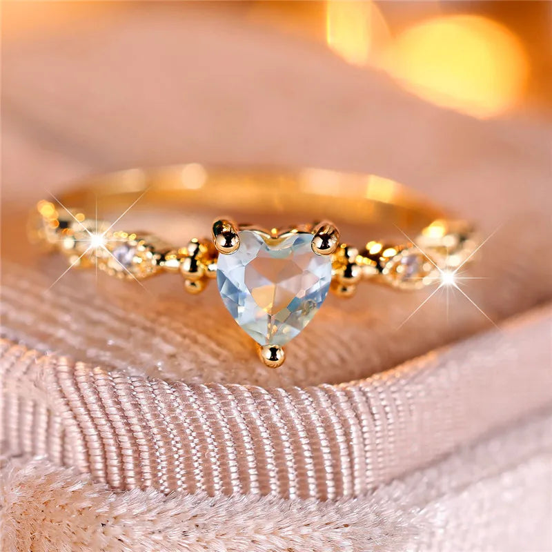 Trendy Yellow Gold Heart Ring with Blue Zircon