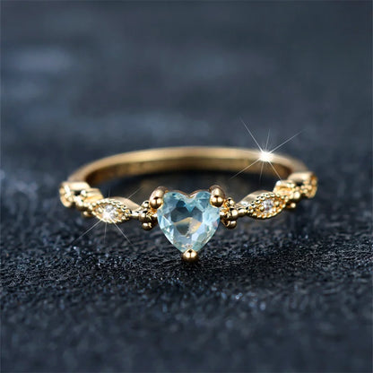 Trendy Yellow Gold Heart Ring with Blue Zircon