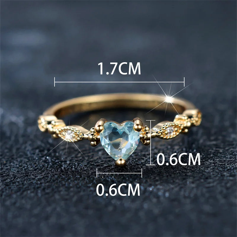 Trendy Yellow Gold Heart Ring with Blue Zircon