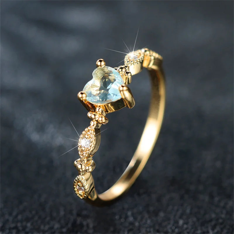 Trendy Yellow Gold Heart Ring with Blue Zircon